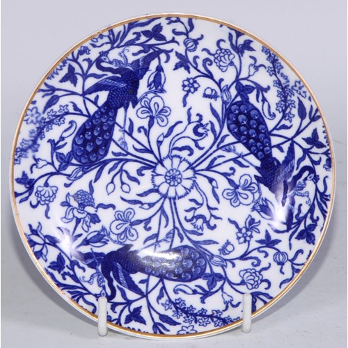 595 - A Derby Crown Porcelain tea service, printed in tones of underglaze blue, the lobed oval tray 45cm w... 