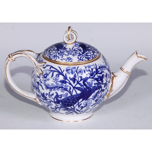 595 - A Derby Crown Porcelain tea service, printed in tones of underglaze blue, the lobed oval tray 45cm w... 