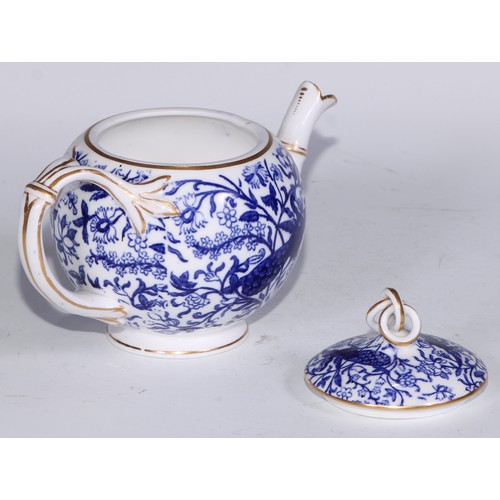 595 - A Derby Crown Porcelain tea service, printed in tones of underglaze blue, the lobed oval tray 45cm w... 