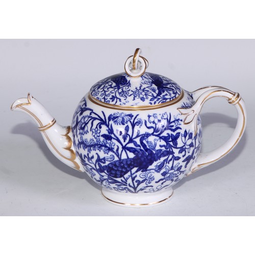 595 - A Derby Crown Porcelain tea service, printed in tones of underglaze blue, the lobed oval tray 45cm w... 