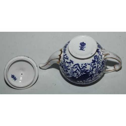 595 - A Derby Crown Porcelain tea service, printed in tones of underglaze blue, the lobed oval tray 45cm w... 