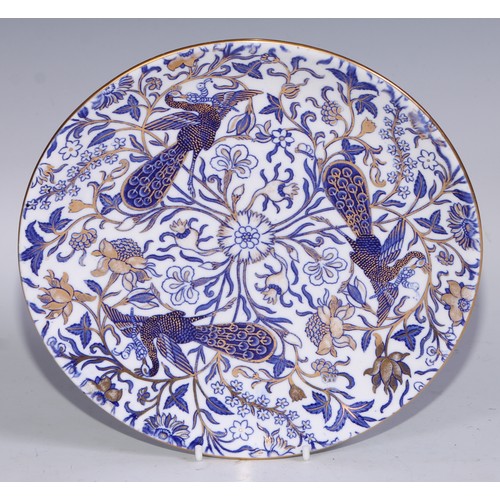 595 - A Derby Crown Porcelain tea service, printed in tones of underglaze blue, the lobed oval tray 45cm w... 