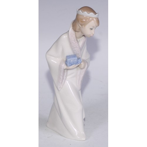 826 - A Lladro figure, Boy with Crown, 21cm high, boxed; others (3)