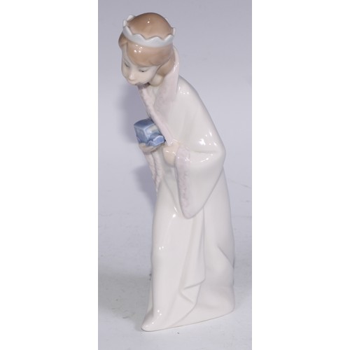 826 - A Lladro figure, Boy with Crown, 21cm high, boxed; others (3)