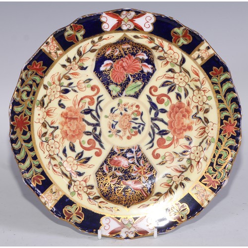 632 - A Royal Crown Derby dessert service, comprising a comport, two sihes and nine plates, decorated in t... 