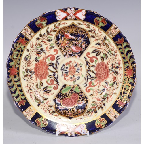 632 - A Royal Crown Derby dessert service, comprising a comport, two sihes and nine plates, decorated in t... 