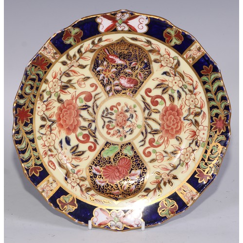 632 - A Royal Crown Derby dessert service, comprising a comport, two sihes and nine plates, decorated in t... 