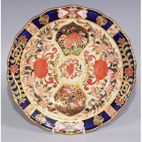 632 - A Royal Crown Derby dessert service, comprising a comport, two sihes and nine plates, decorated in t... 