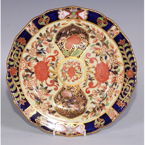 632 - A Royal Crown Derby dessert service, comprising a comport, two sihes and nine plates, decorated in t... 