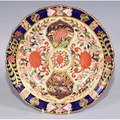 632 - A Royal Crown Derby dessert service, comprising a comport, two sihes and nine plates, decorated in t... 