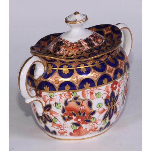 638 - A Royal Crown Derby Imari sucrier and cover, 15cm wide, printed mark; an 1128 pattern tea cup; a 245... 