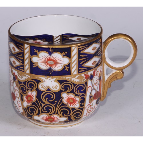 638 - A Royal Crown Derby Imari sucrier and cover, 15cm wide, printed mark; an 1128 pattern tea cup; a 245... 