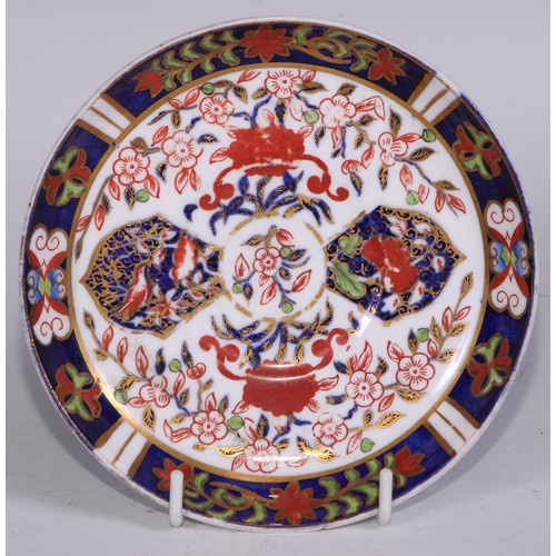 638 - A Royal Crown Derby Imari sucrier and cover, 15cm wide, printed mark; an 1128 pattern tea cup; a 245... 