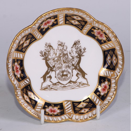 638 - A Royal Crown Derby Imari sucrier and cover, 15cm wide, printed mark; an 1128 pattern tea cup; a 245... 