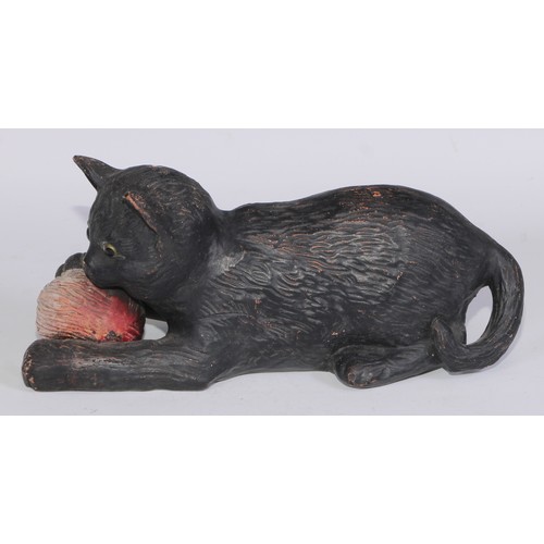 760 - Ceramics - a Bretby model of a cat, modelled with a ball, impressed mark; a 19th century beer jug, B... 