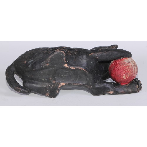 760 - Ceramics - a Bretby model of a cat, modelled with a ball, impressed mark; a 19th century beer jug, B... 