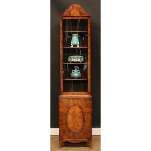 354 - A George I style walnut display cabinet, of narrow proportions, arched top above a glazed door enclo... 