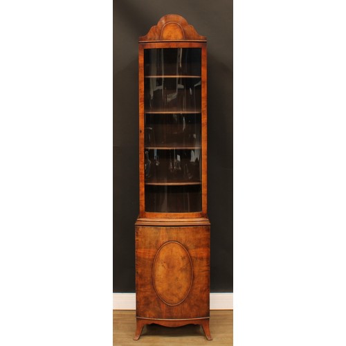 354 - A George I style walnut display cabinet, of narrow proportions, arched top above a glazed door enclo... 