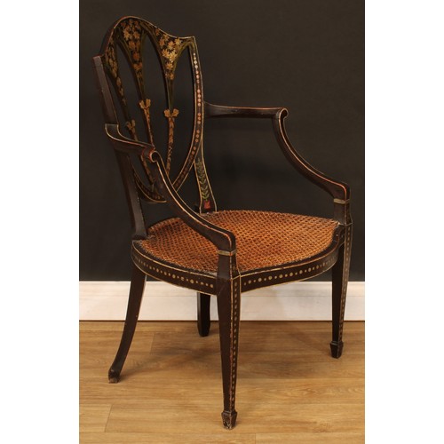 430 - A Hepplewhite Revival painted and ebonised open armchair, cane seat, tapered square forelegs, spade ... 