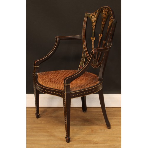 430 - A Hepplewhite Revival painted and ebonised open armchair, cane seat, tapered square forelegs, spade ... 