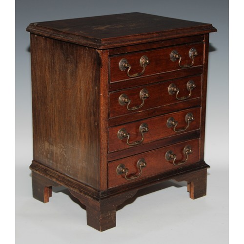 523 - Miniature Furniture - a George III style table top chest, rectangular top above four long drawers, s... 