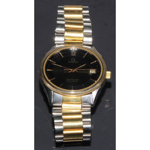 83 - An Omega Seamaster gold and stainless steel quartz gentleman's wristwatch, 3cm black dial with baton... 