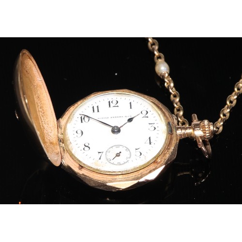 105 - A 14ct gold and diamond hunter miniature fob watch, the enamel dial inscribed 'Schild Frères & Co', ... 