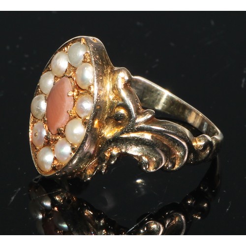 137 - A 19th century seed pearl and hardstone navette shaped ring, the shoulders cast with leafy scrolls, ... 