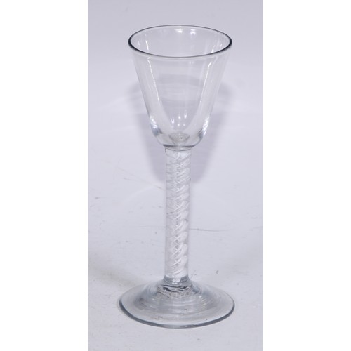 817 - A George III opaque twist wine glass, conical bowl, double-helix stem, domed foot, 15cm high, c.1765