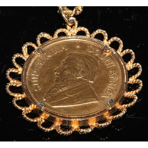 215 - A South Africa Krugerrand, 1974, 18ct gold mount and chain, 63g