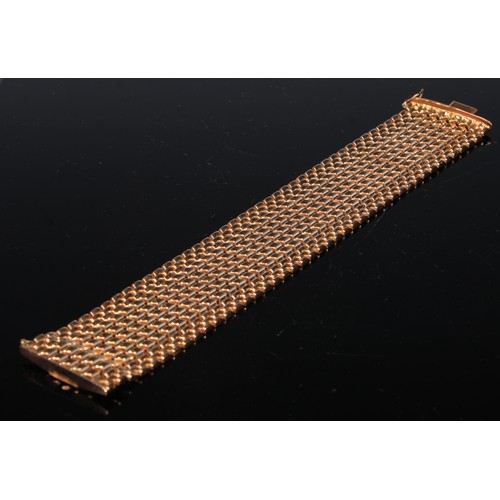 242 - An 18ct gold Brevet articulated bracelet, formed from interlocked zigzag bands, 19cm long, 53g