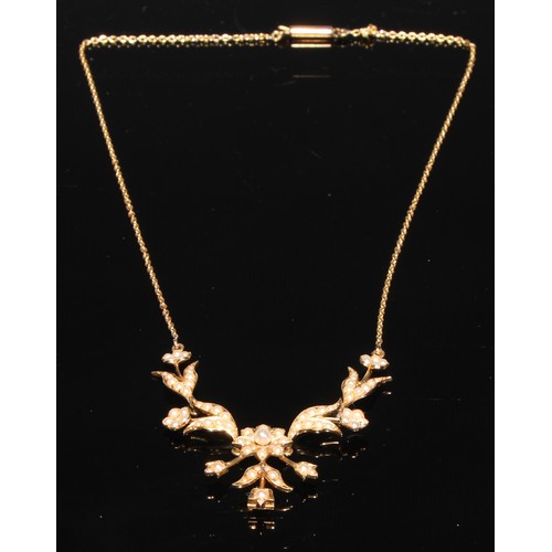 234 - A Victorian style 15ct gold and seed pearl necklace, the articulated sections formed as flowering st... 