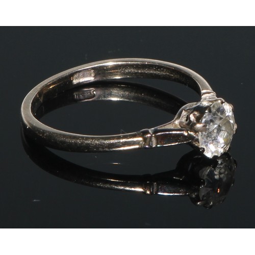 170 - A diamond solitaire ring, knoped and divided shoulders, 18ct white gold shank, size M