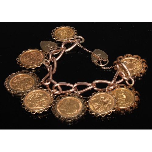 193 - A nine coin 9ct gold chain link bracelet, comprising sovereigns 1910, 1880, 1893, 1967, 1900 and 191... 