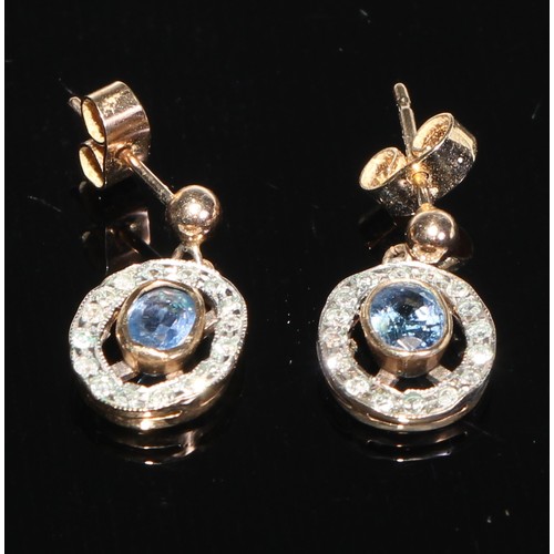 202 - A pair of sapphire and diamond oval cluster drop earrings, the pale blue stones open set within a ba... 