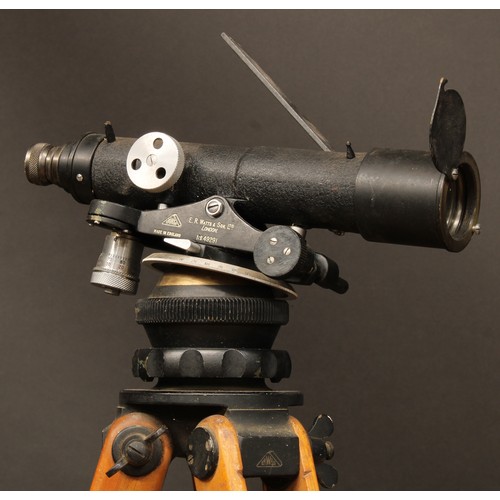 393 - A theodolite, maker marked ER Watts & Son Ltd, serial no.49291, complete with leather case, tripod a... 