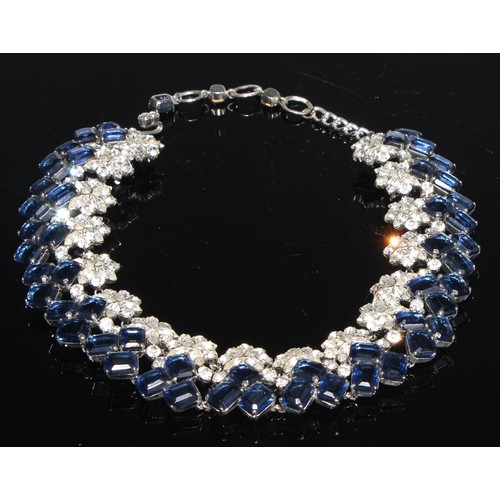 156 - A Christian Dior Bijoux fashion necklace, set with an arrangement of faceted blue and white glass st... 