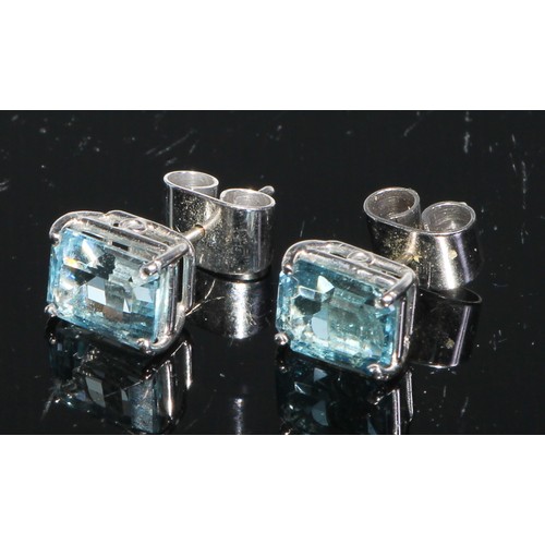 199 - A pair of aquamarine baguette cut earrings, each 8.10mm x 6.30mm x 3.20mm, total estimated aquamarin... 