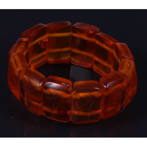 181 - A graduated deep orangy amber coloured resin faceted block bead necklace, beads ranging between appr... 