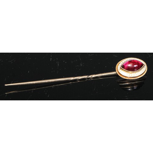 128 - A 19th century oval cabochon garnet stick pin, yellow metal mount;  another smaller;  others enamell... 