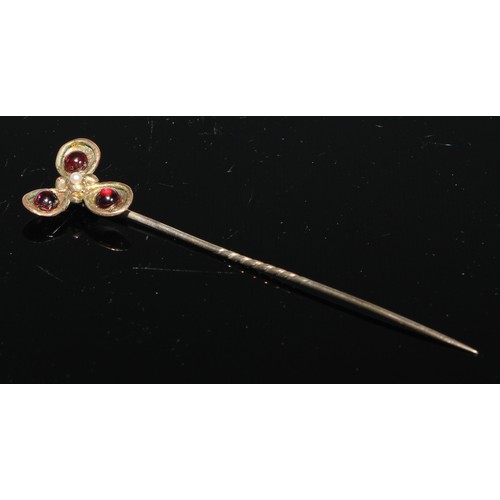 128 - A 19th century oval cabochon garnet stick pin, yellow metal mount;  another smaller;  others enamell... 