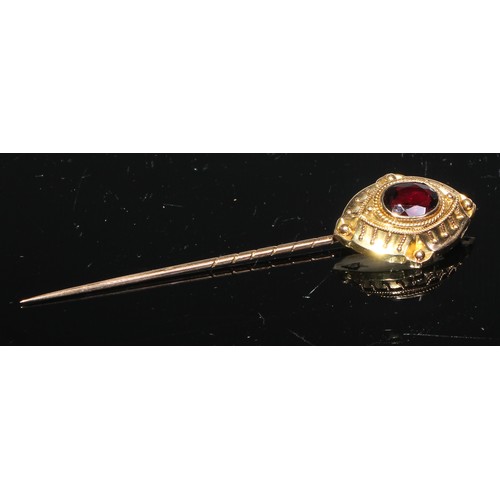 128 - A 19th century oval cabochon garnet stick pin, yellow metal mount;  another smaller;  others enamell... 