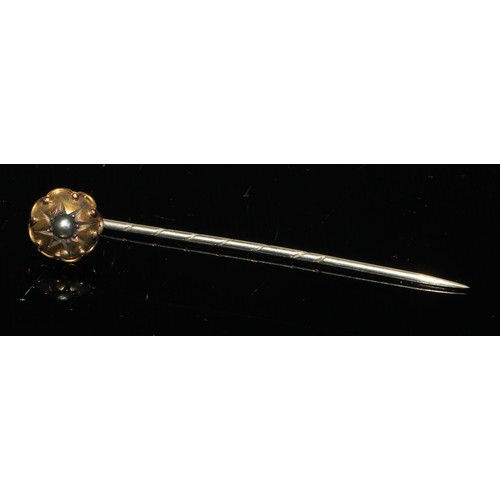 189 - A late 19th century diamond and sapphire yellow metal stick pin, as a ladybird, unmarked;  others, m... 