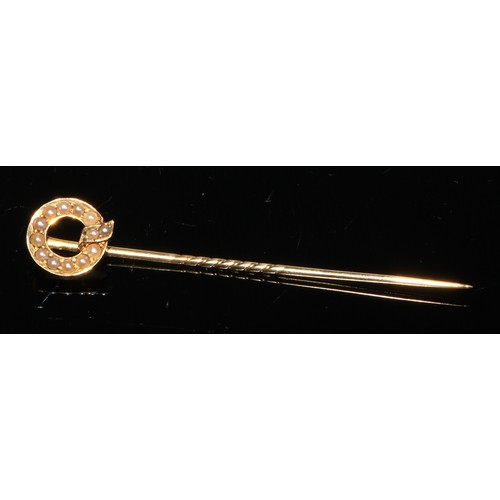 189 - A late 19th century diamond and sapphire yellow metal stick pin, as a ladybird, unmarked;  others, m... 