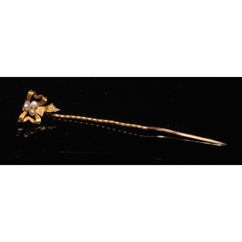 189 - A late 19th century diamond and sapphire yellow metal stick pin, as a ladybird, unmarked;  others, m... 