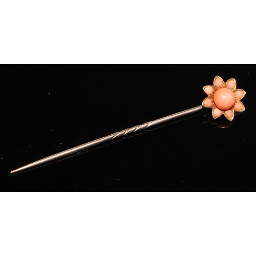 121 - A 19th century diamond and coral stick pin, central coral cabochon quartered by round old cut diamon... 