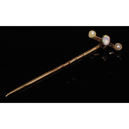 127 - A 19th century opal stick pin, yellow metal star disc mount, unmarked; others seed pearl and opal;  ... 