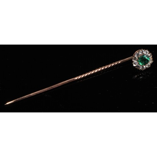 124 - A 19th century diamond floral cluster stick pin, set with nine old cut diamond accents, unmarked yel... 