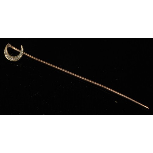 124 - A 19th century diamond floral cluster stick pin, set with nine old cut diamond accents, unmarked yel... 