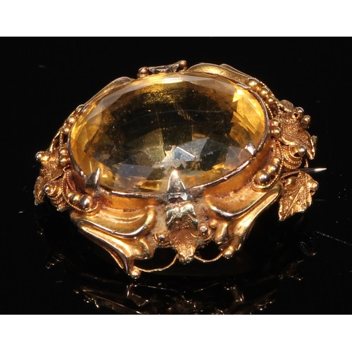 227 - A Victorian pale yellow citrine brooch, unmarked yellow metal mount, another smaller 20.8g gross (2)